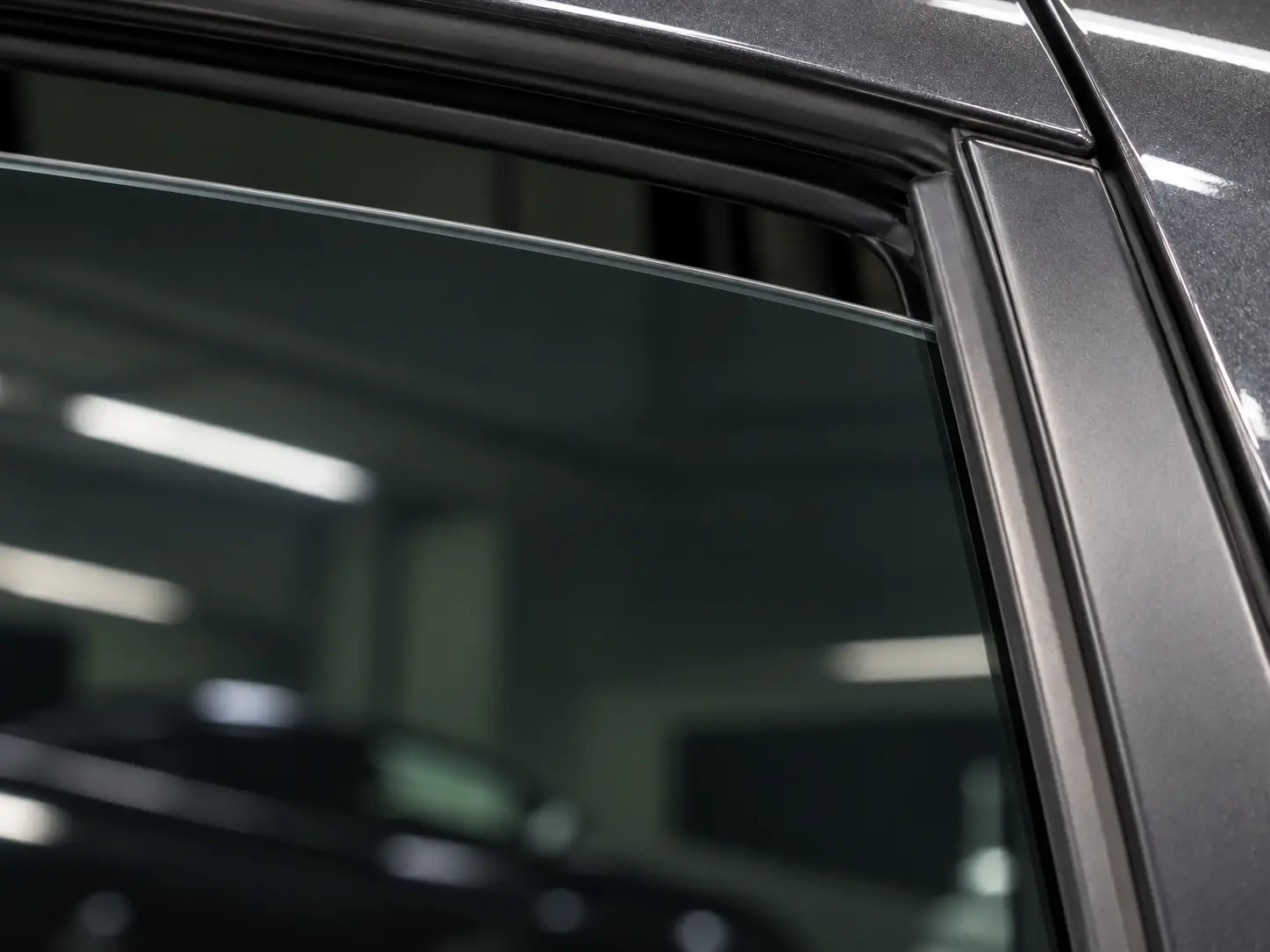 Illustrative professional window tint fitted on clean glass